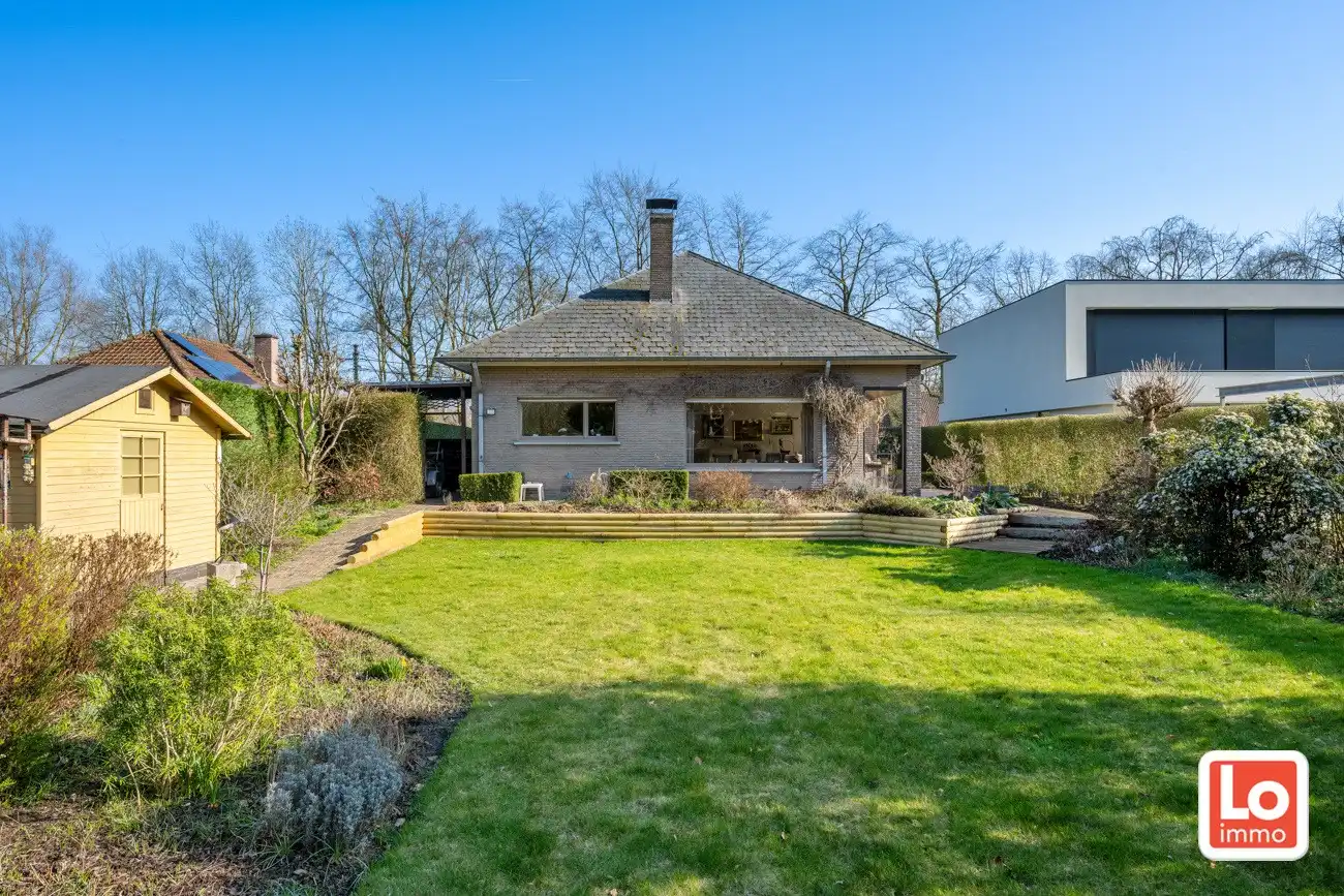 Degelijke open gelijkvloerse woning met inpandige garage en grote tuin op een groene toplocatie in Beervelde! foto 27