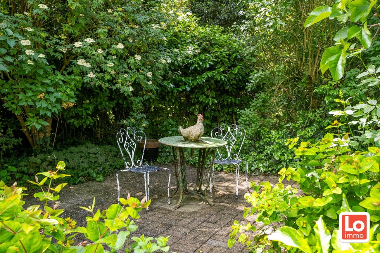 Charmante open woning met carport en héél grote aangename tuin gelegen op een toplocatie vlakbij het centrum van Zaffelare! foto 5