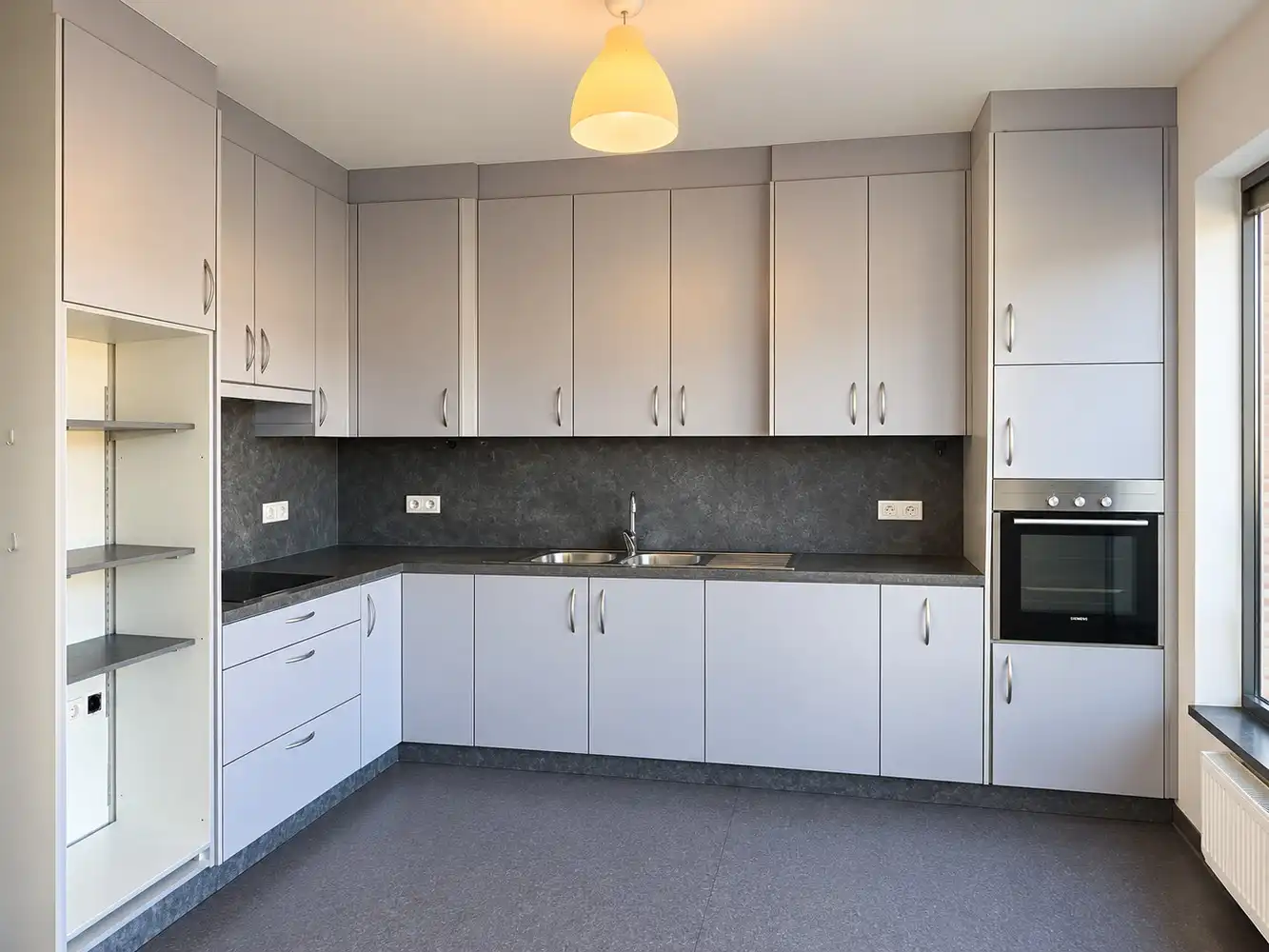 Ruim en zonnig 3-slaapkamerappartement van ca. 160 m² in het centrum van Merelbeke en mogelijkheid tot terras foto 5
