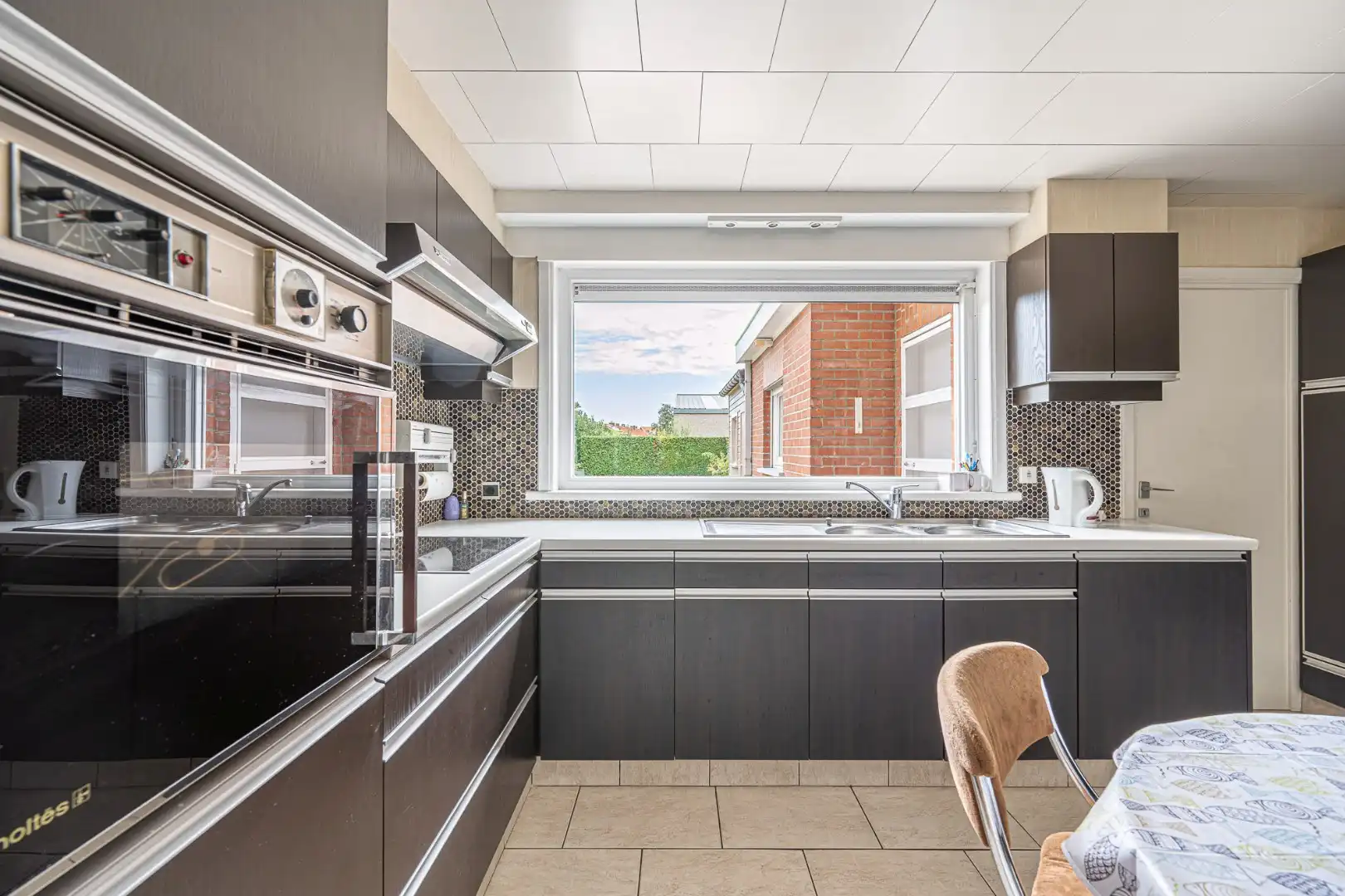 Ruime woning met 3 slaapkamers, garage en zonnige tuin in Geluwe foto 4