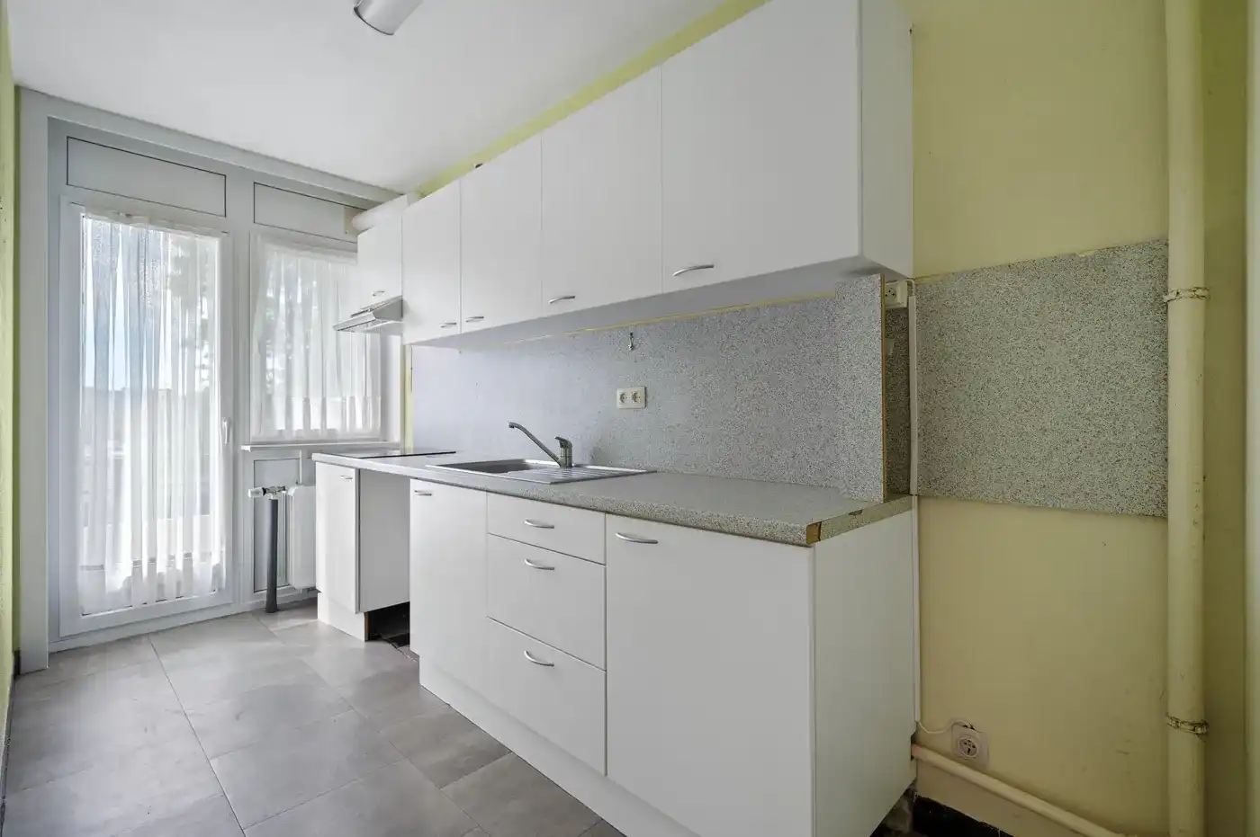 Instapklaar 2-slaapkamer appartement met garage in het hart van Tienen foto 7