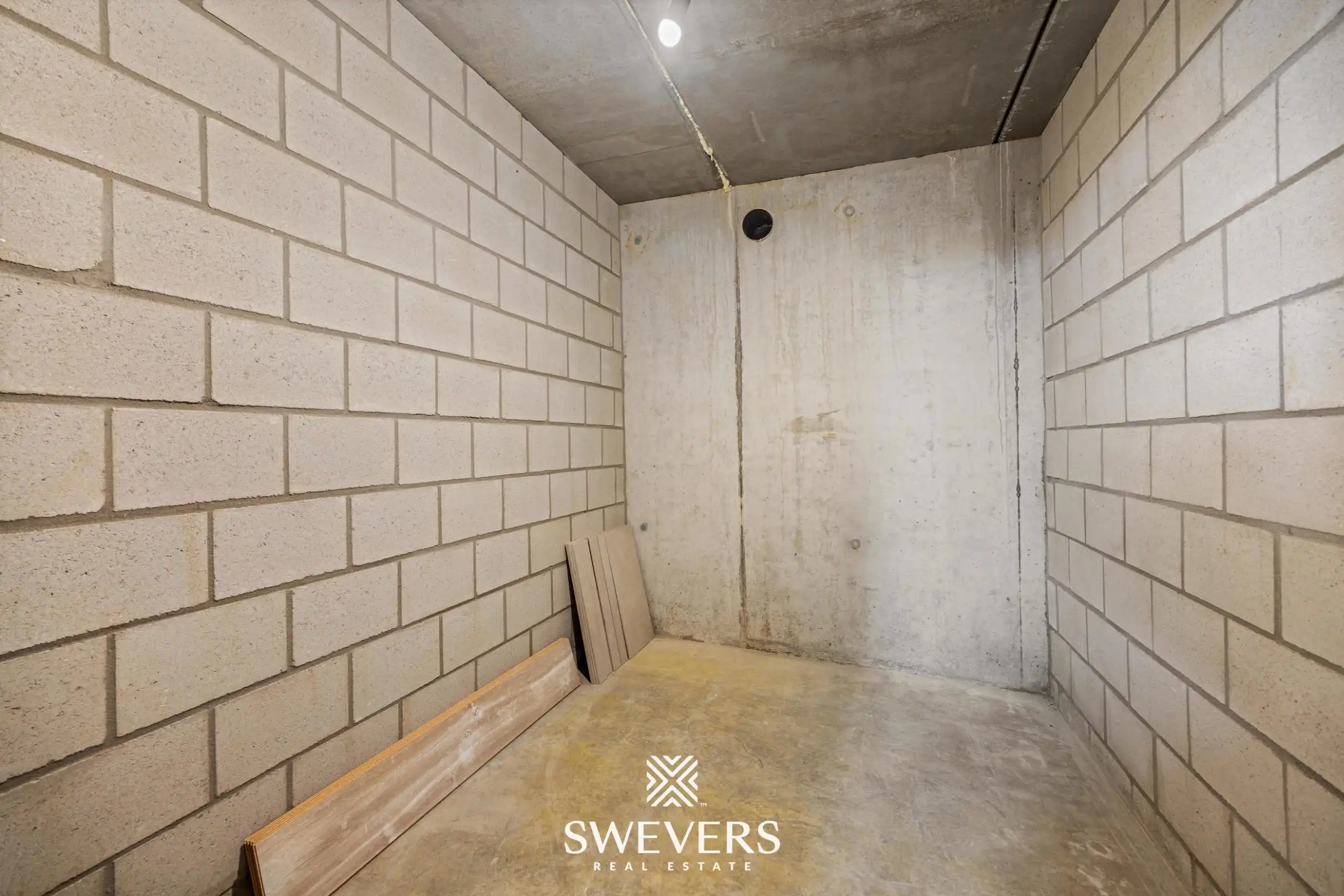 Modern gelijkvloers appartement met privétuin en dubbele parking foto 16