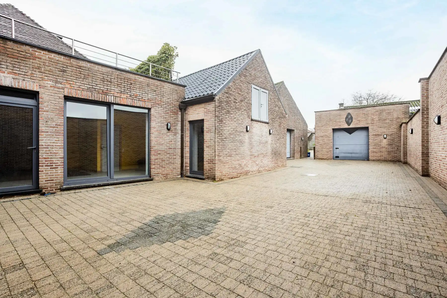 Polyvalente woning met tuin:  momenteel 2 appartementen garage en groot magazijn! foto 32