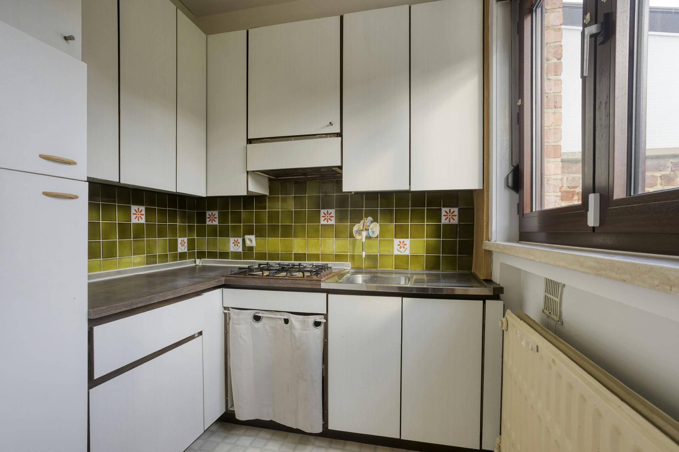 Te renoveren woning met potentieel in Sint-Agatha-Berchem! foto 5