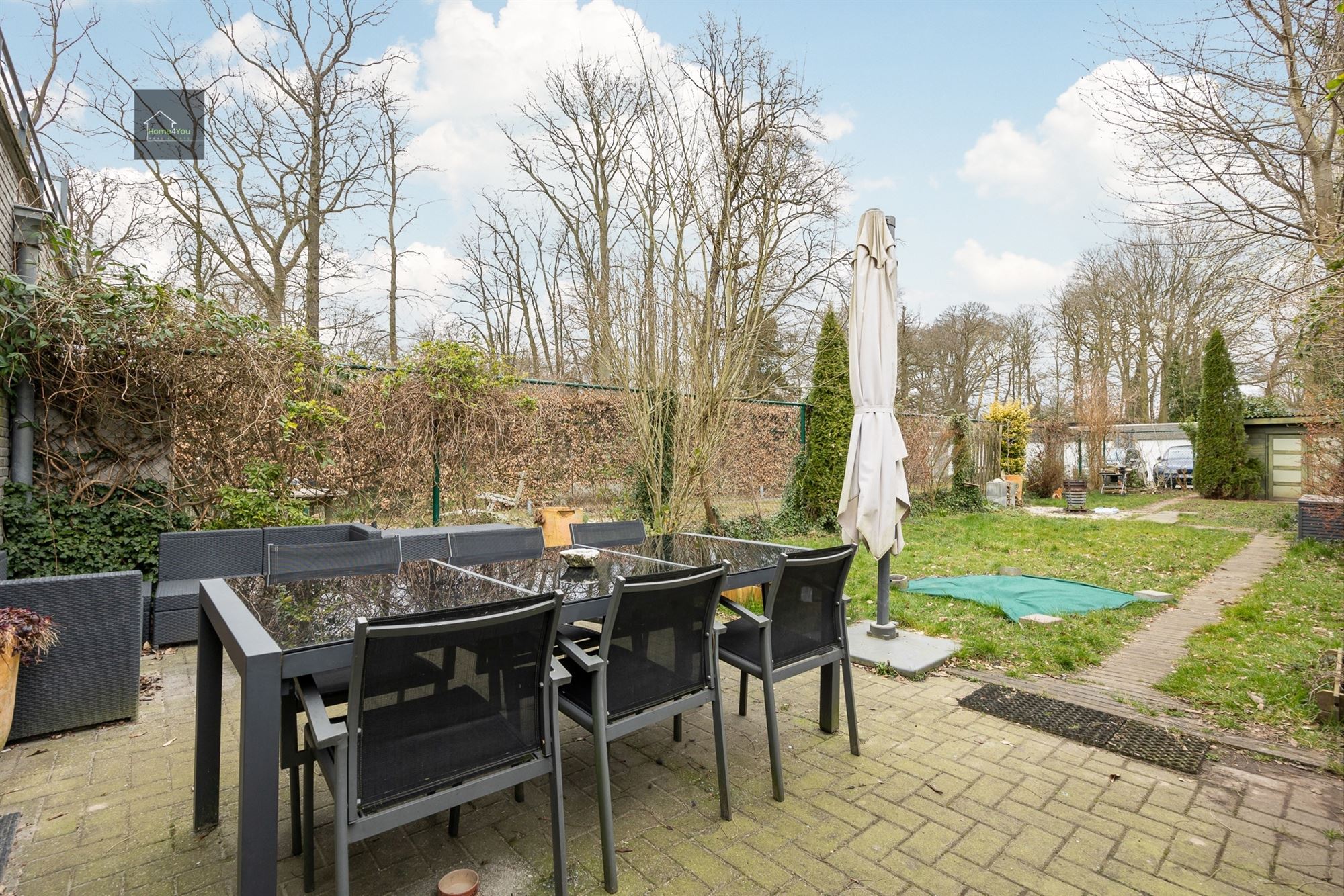Ruim gelijkvloers appartement met tuin, parking en garagebox foto 15