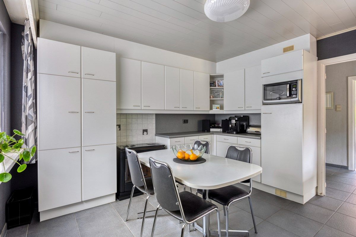 Rustig gelegen woning met oa 4 slpks op een mooi breed perceel van 21 are. foto 11