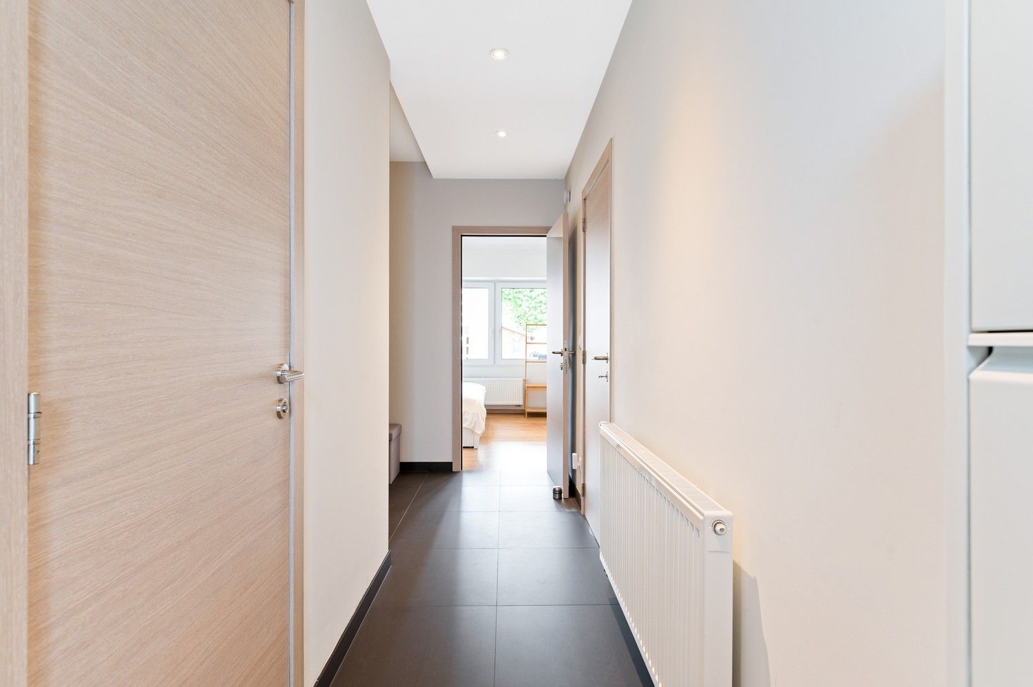Energiezuinige woning met 3 slaapkamers, 2 badkamers,  garage en tuin in Schoten! foto 3