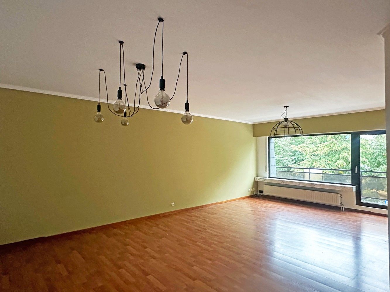 Gunstig centraal gelegen 2-slaapkamerappartement met garagebox foto 2