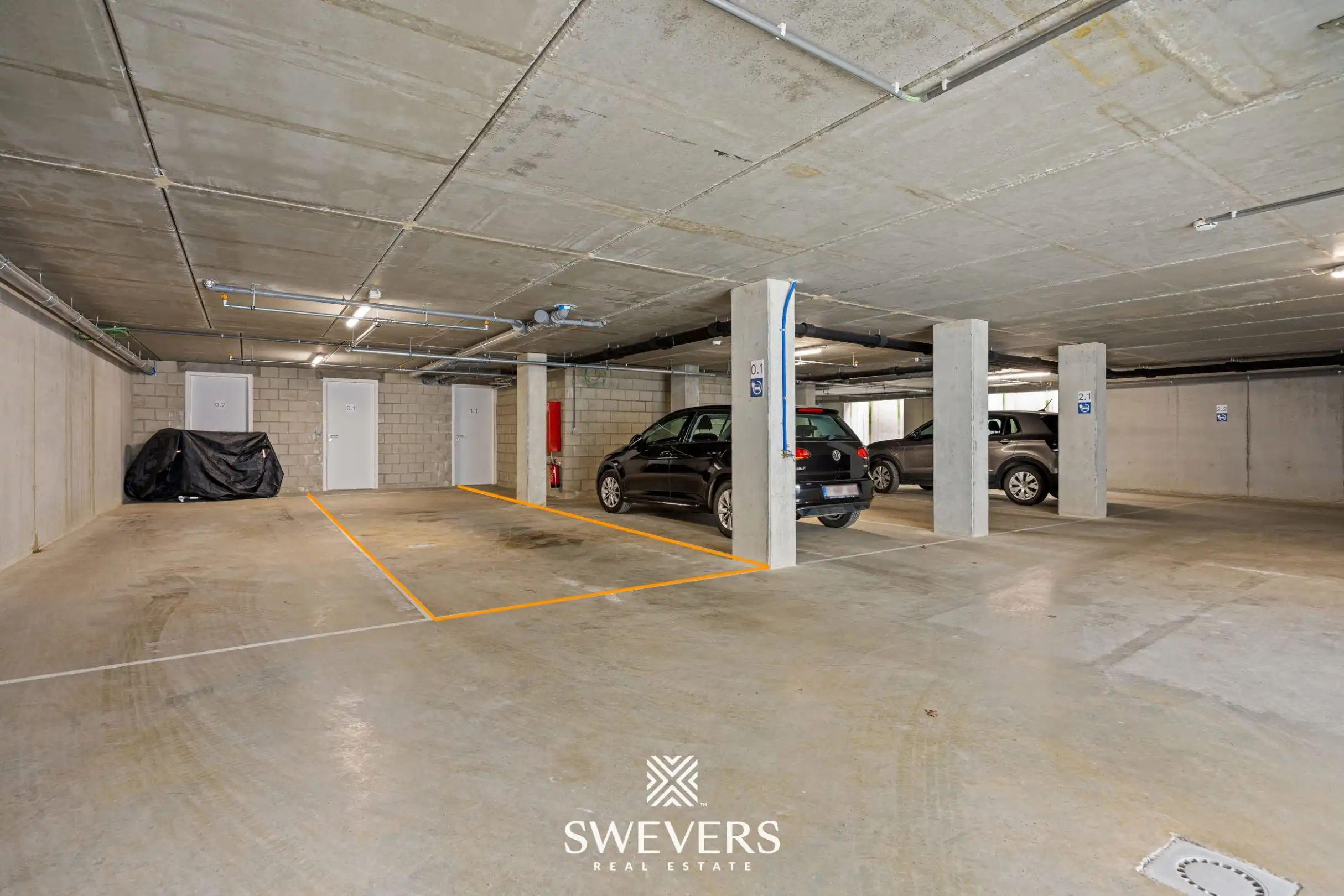 Modern gelijkvloers appartement met privétuin en dubbele parking foto 17