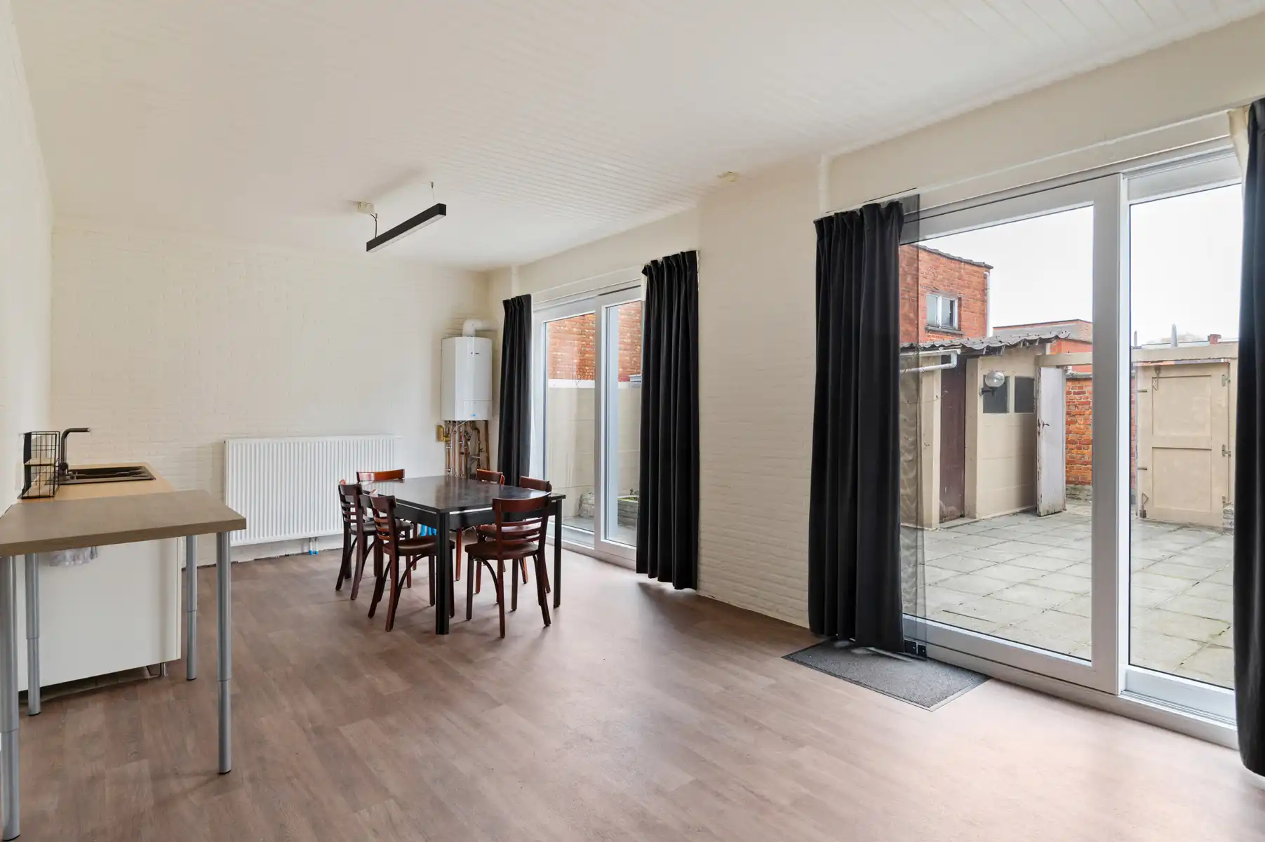 Gelijkvloers handelsruimte met koer én woonst op verdieping foto 5