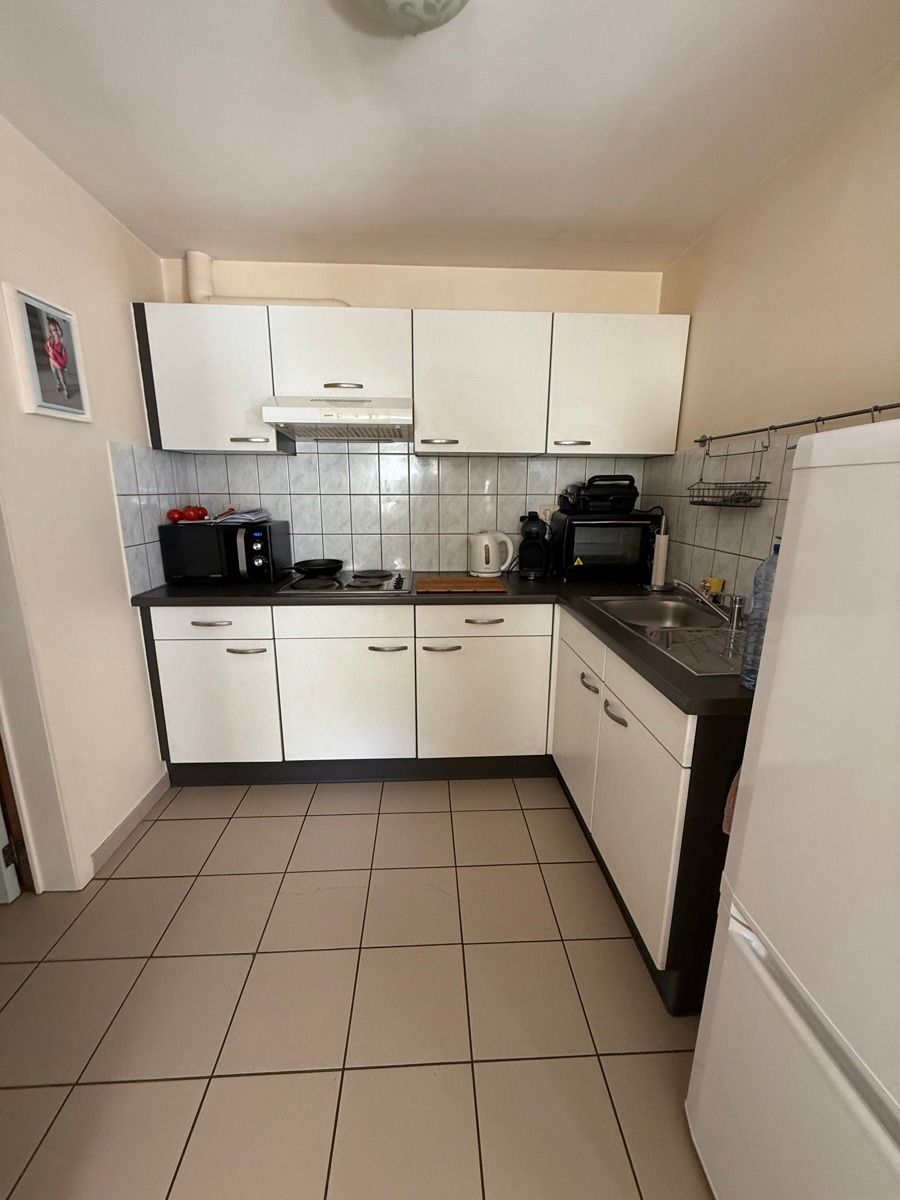 Instapklaar appartement met terras op toplocatie in Genk foto 6