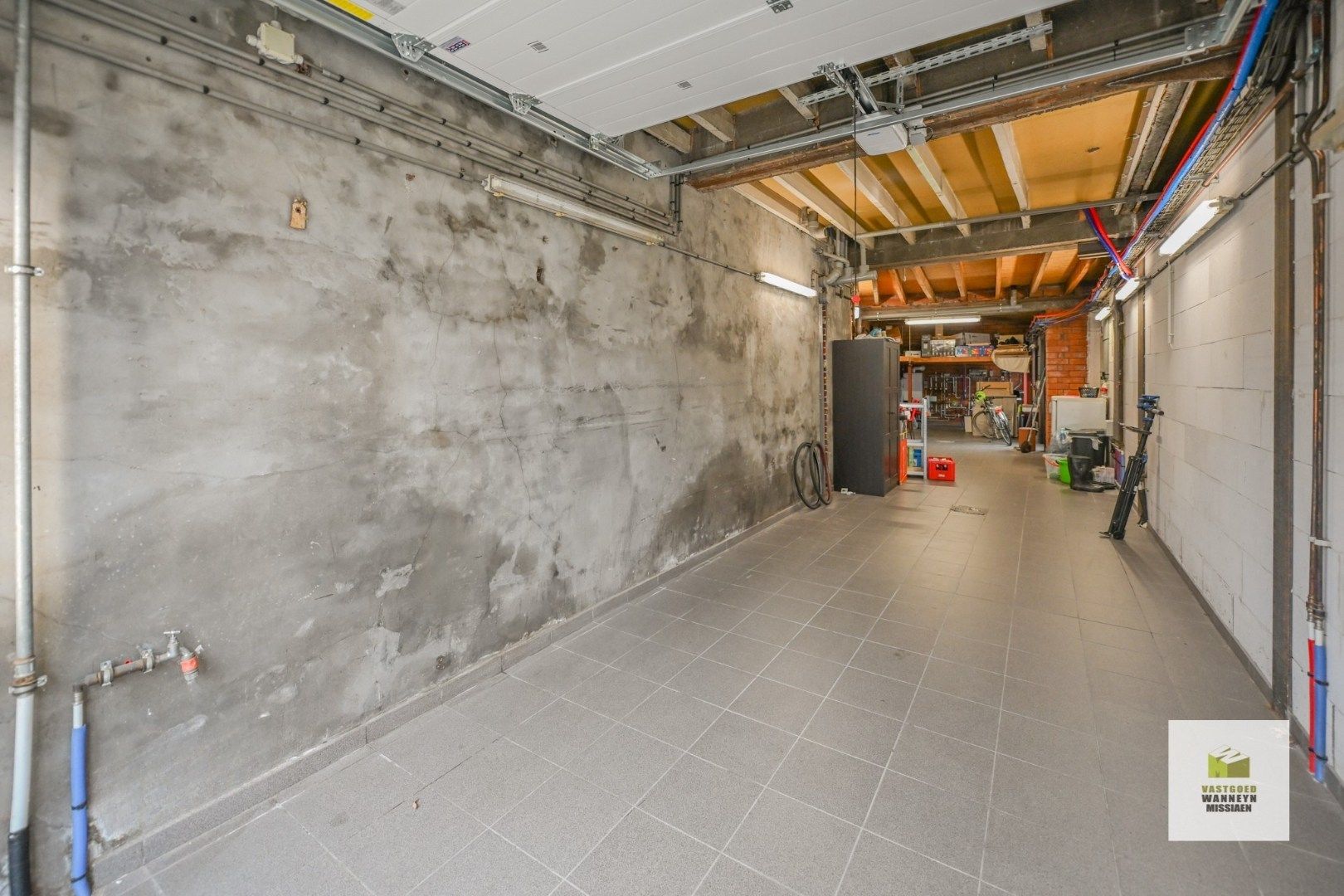 Ruime gezinswoning met tuin, 3 slaapkamers en een grote garage  foto 3