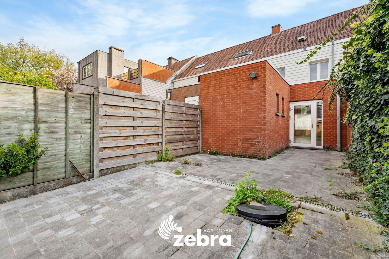 Licht op te frissen stadswoning met drie slaapkamers te Roeselare! foto 21