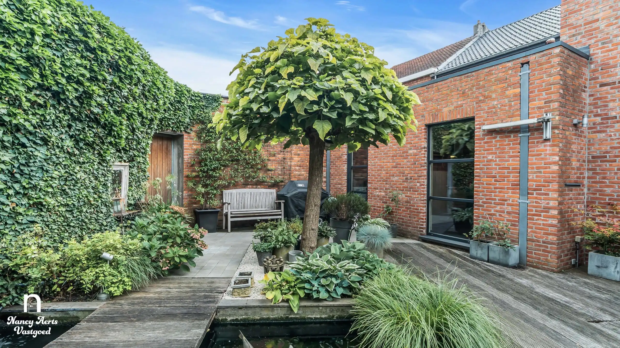 Verrassend ruime woning met praktijkruimte en gezellige tuin foto 23