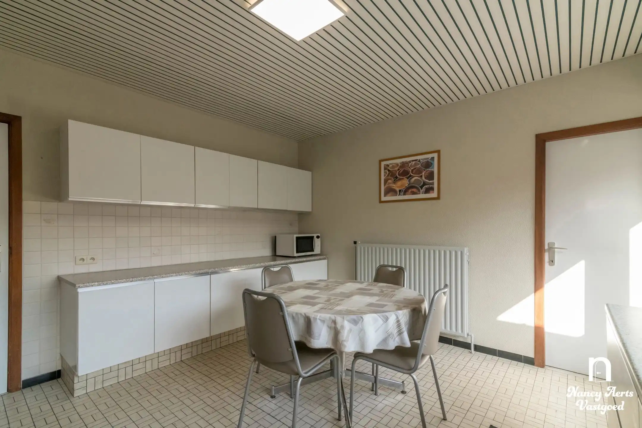 Goed onderhouden gezinswoning met grote tuin foto 20