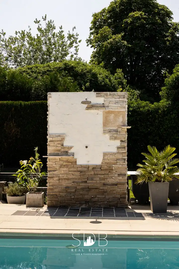 IN OPTIE : Prachtige hedendaagse villa met gezinstuin en zwembad op 1.387m² foto 25