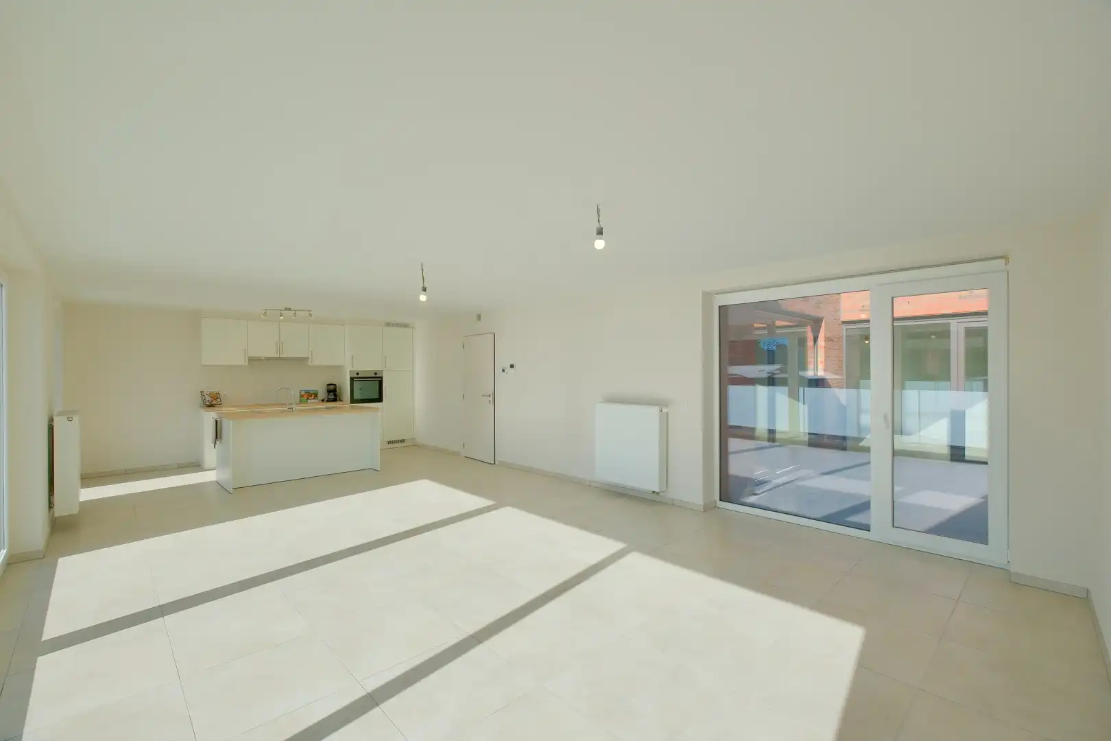 Gelijkvloers app met 2 slaapkamers, ruim terras en binnenkoer! foto 4