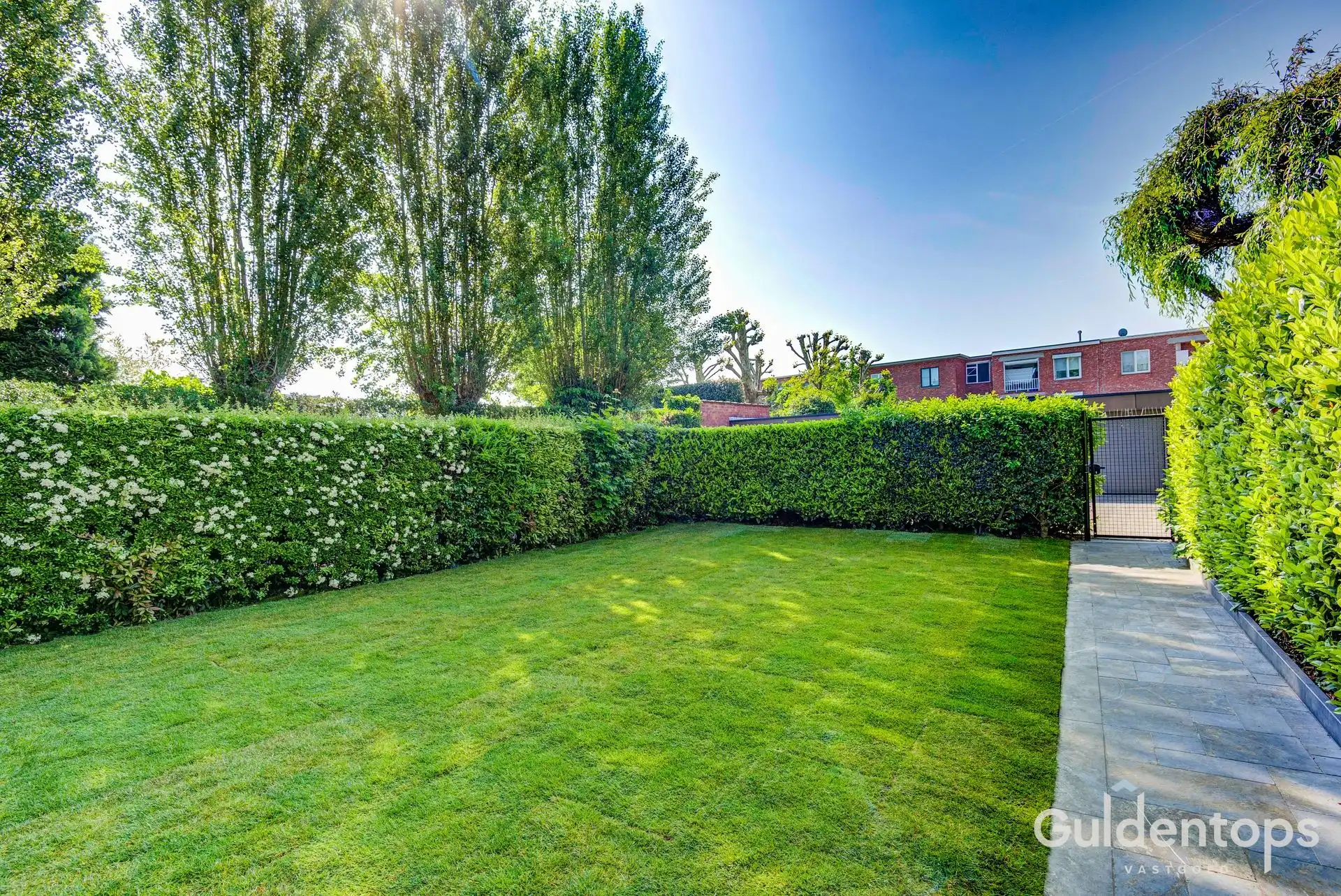 Modern ruim gelijkvloers (2 slk) appartement met ruime tuin foto 26