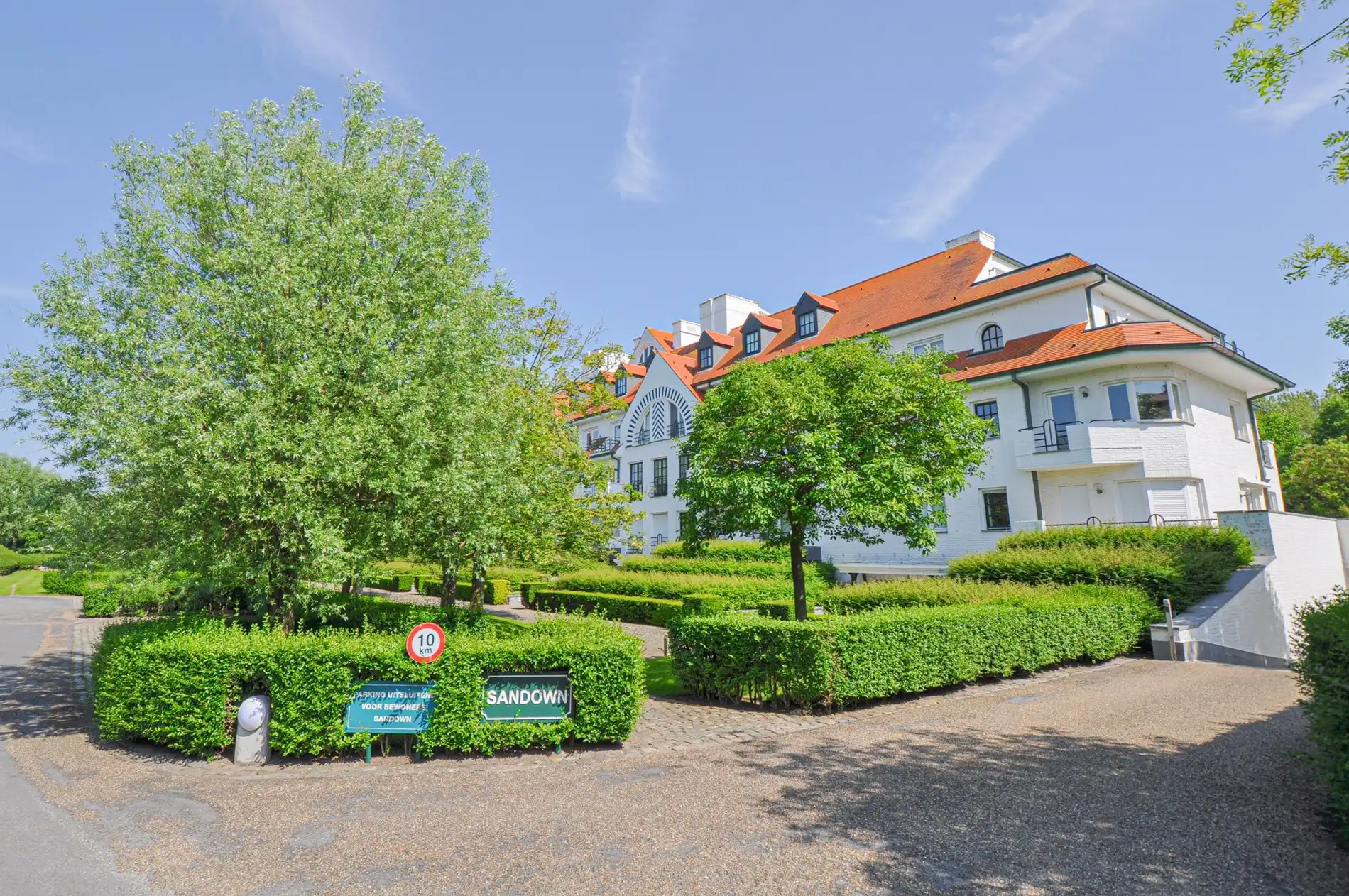 Subliem hoekappartement met ruime terrassen gelegen in het prestigieuze domein Tennis Garden. foto 30