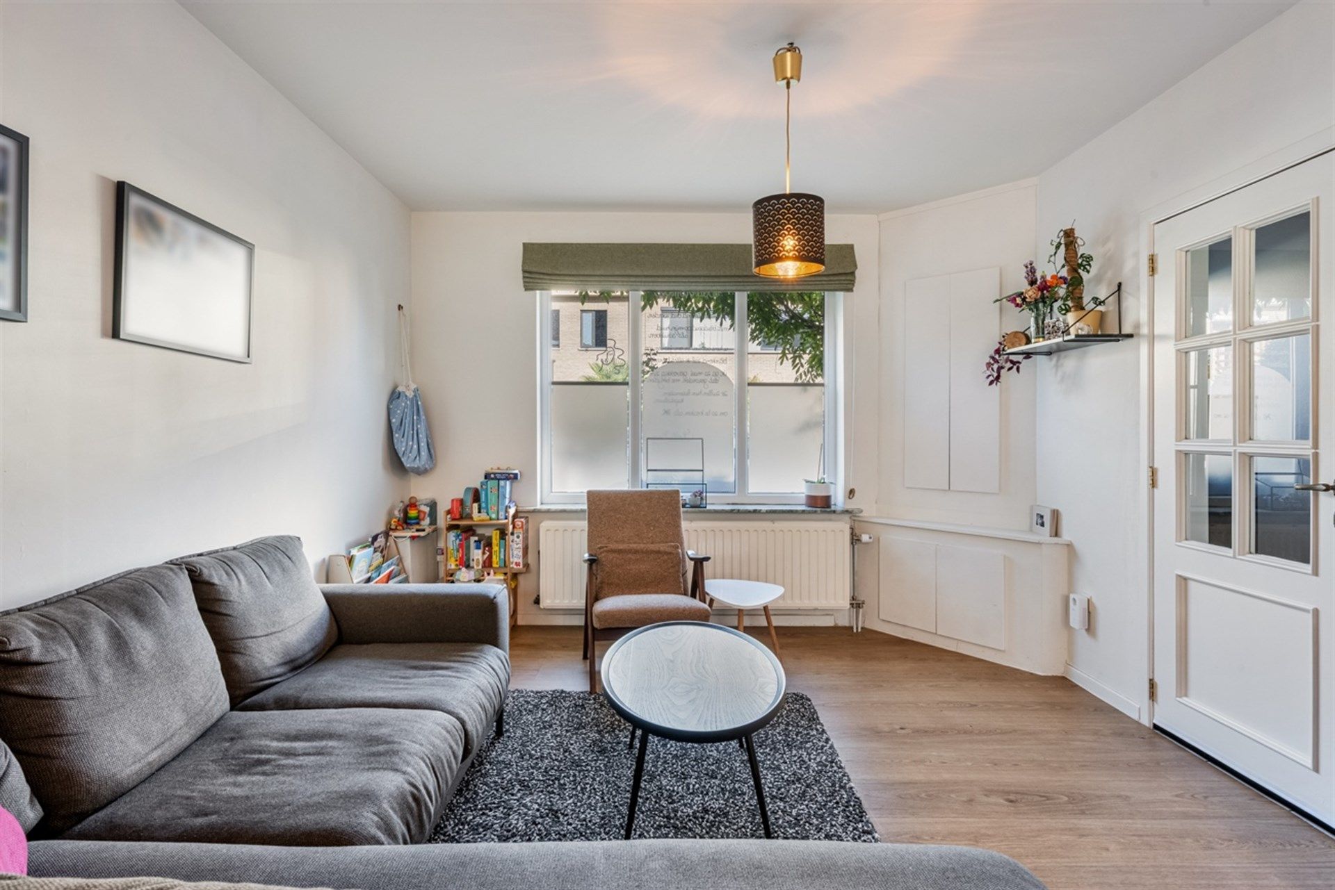 Instapklare woning met zonnige tuin op ruim perceel in rustige straat te Aalst  foto 2