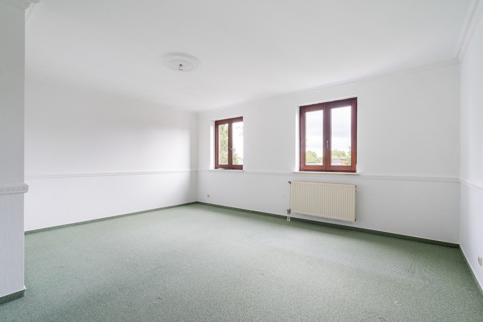 Ruim appartement (145m²) met grote zolderruimte (75m²) foto 6