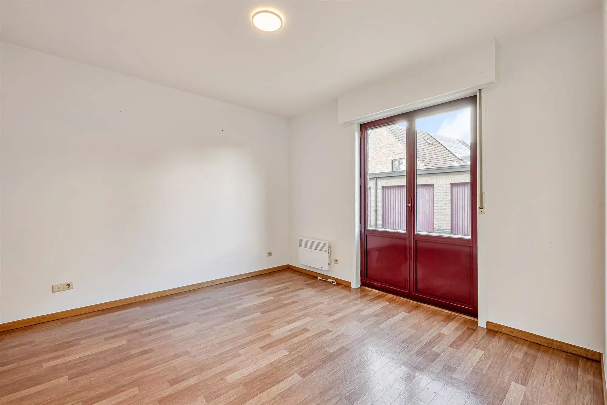 Ruim gelijkvloers appartement met zuidgerichte tuin en garagebox foto 10