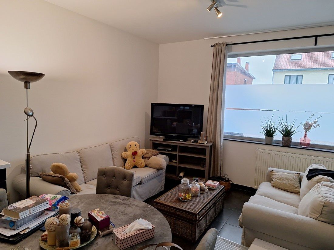 Knus gelijkvloers appartement met leuk zonneterras en tuintje foto 3