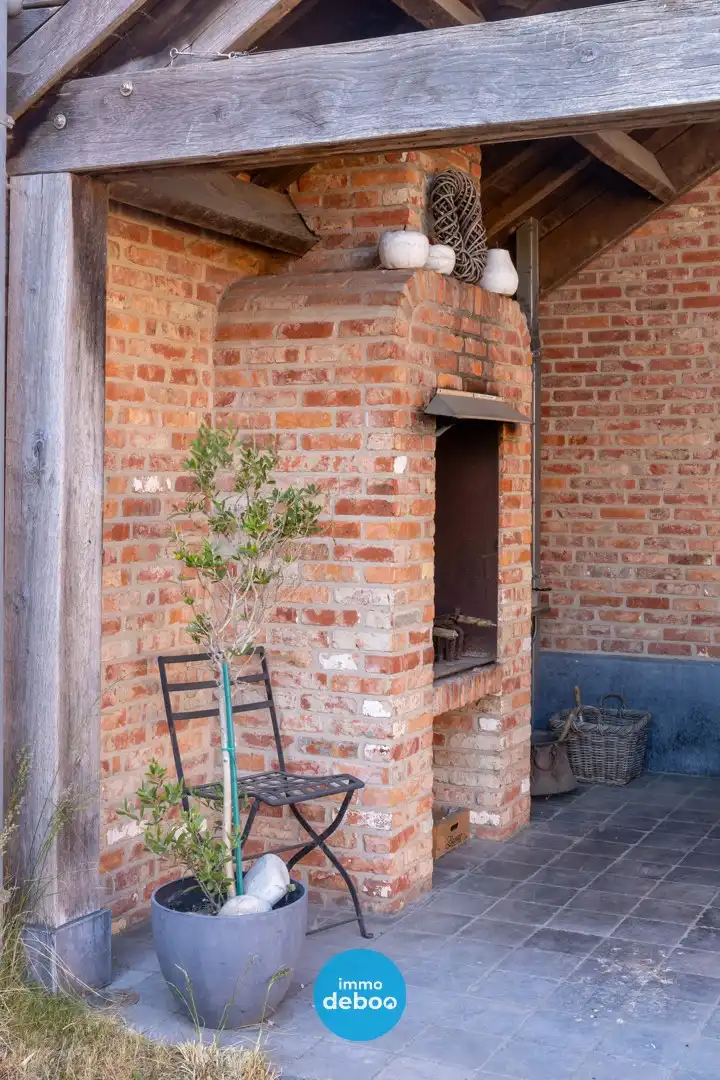 Uitzonderlijk ruime polyvalente woning met zuidgerichte tuin foto 18