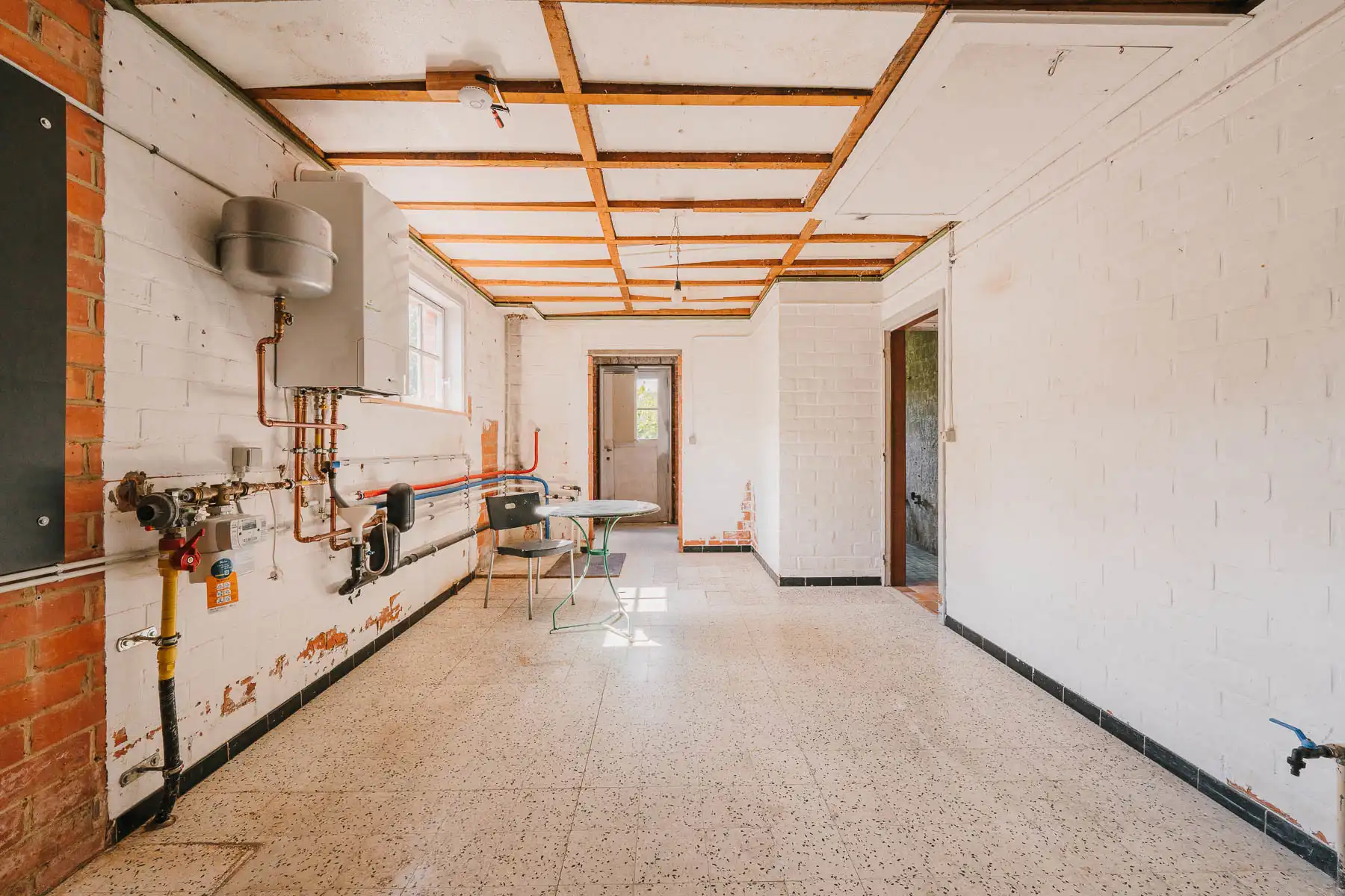 Gelijkvloerse renovatiewoning met groot potentieel foto 19