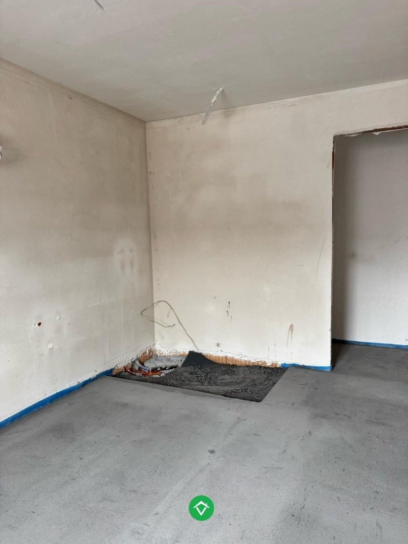 Moderne nieuwbouw tussenwoning met drie slaapkamers en garage in Moere foto 6