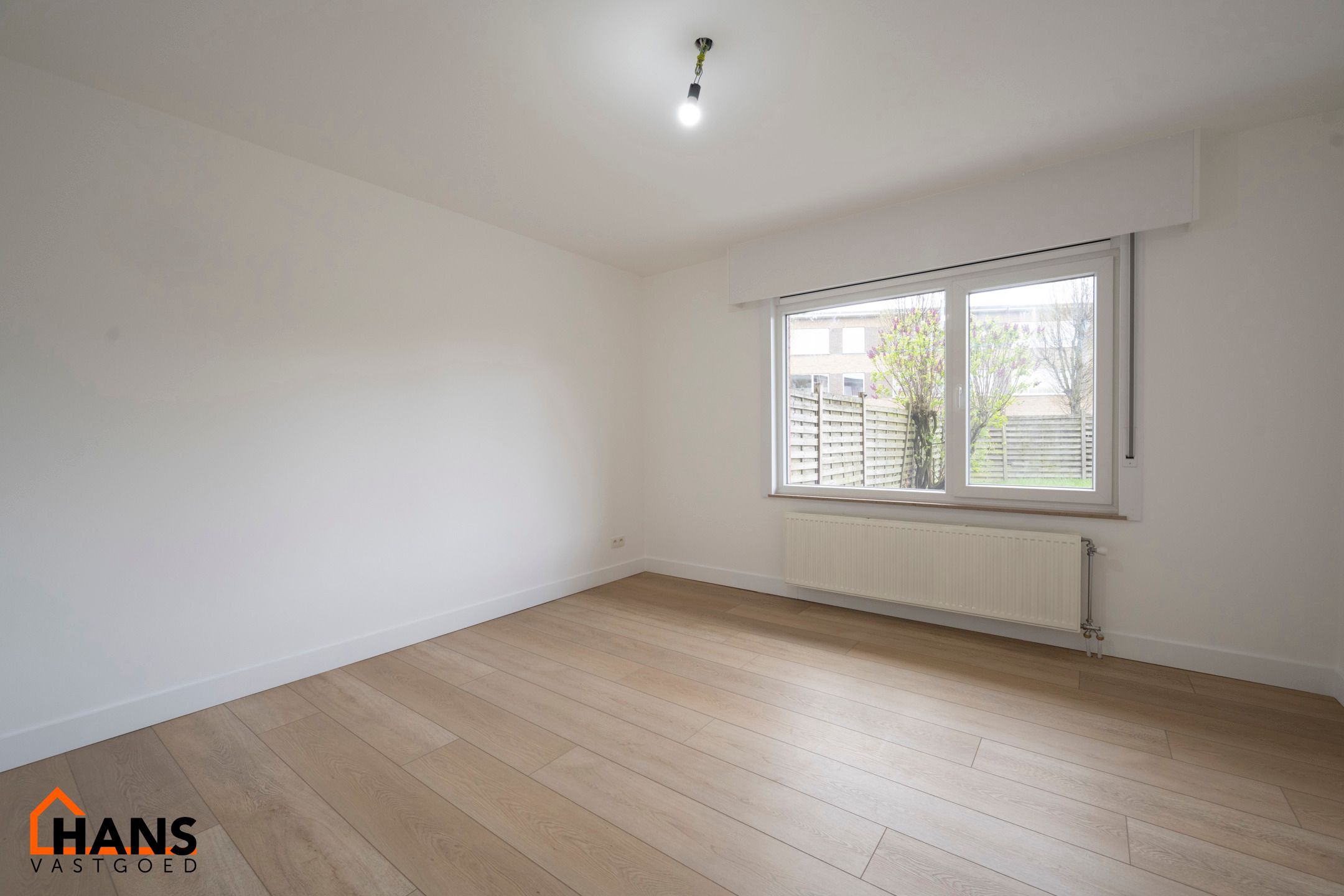 Recent gerenoveerd gelijkvloersappartement met tuin. foto 11