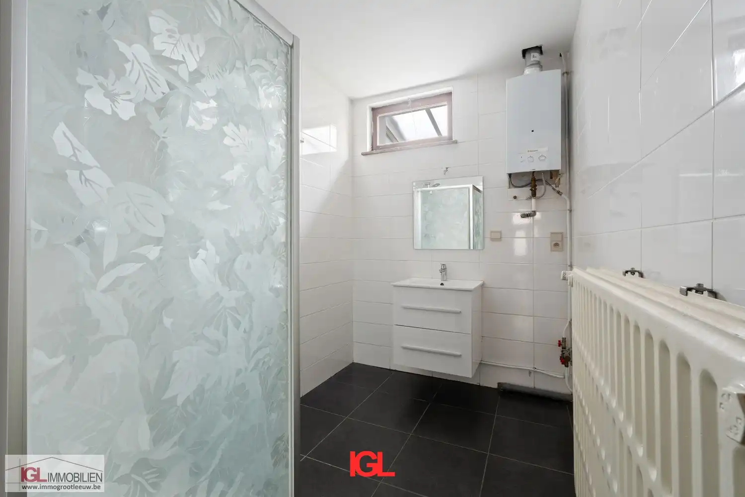 Karaktervolle ééngezinswoning met 4 slaapkamers en mooie tuin in het centrum van Ruisbroek foto 10