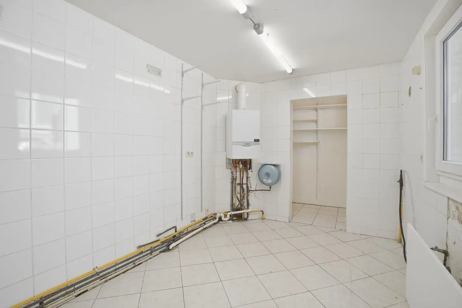 Goed gelegen gebouw op 117m² te De Panne bestaande uit een handelsruimte en woonst.  foto 9