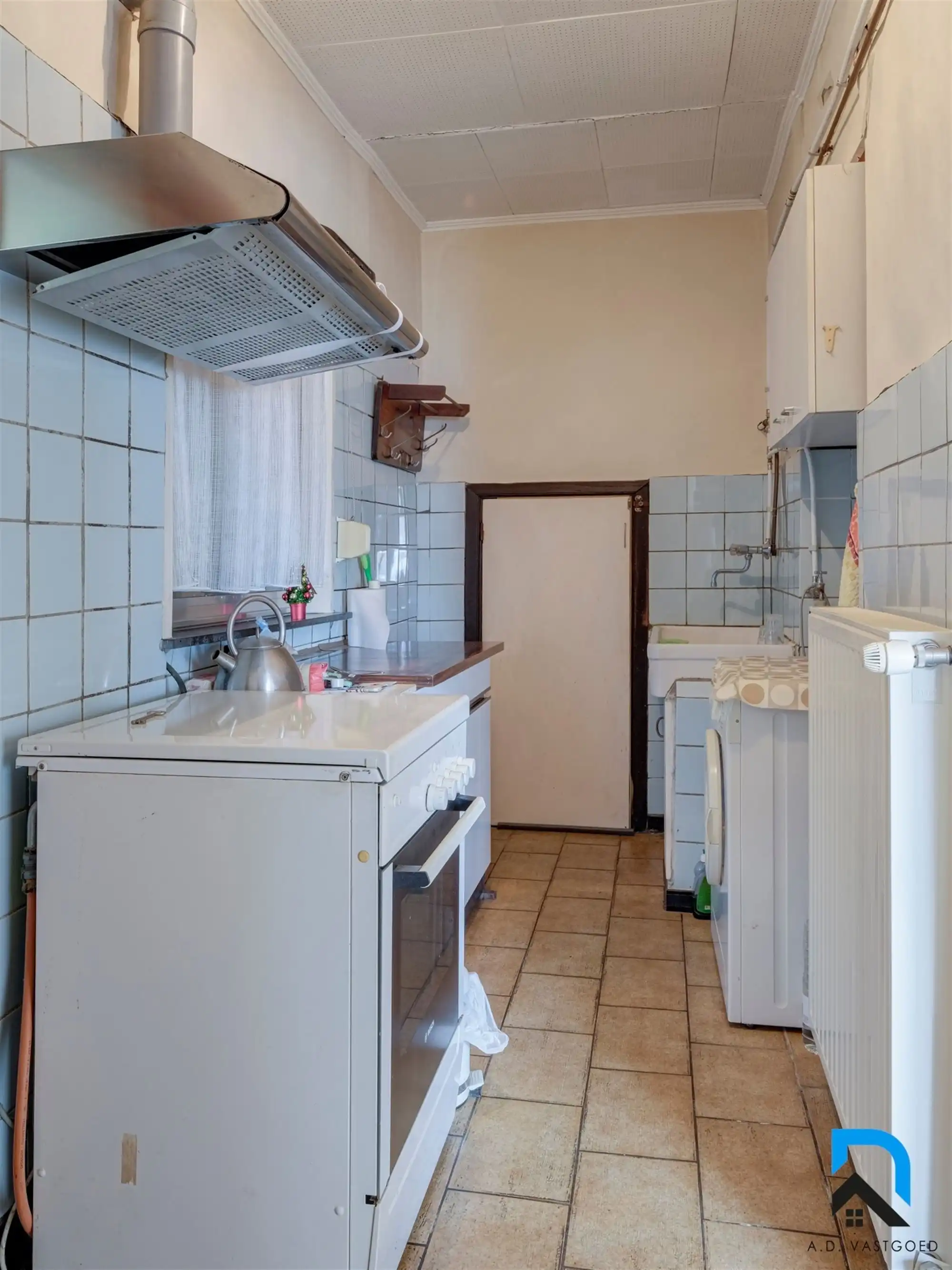 Te renoveren woning met grote tuin in Zwartberg foto 12