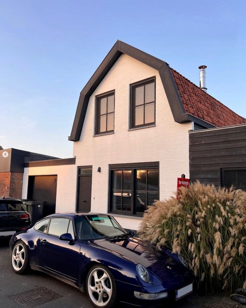 Modern thuis met ongelimiteerd polderzicht foto {{pictureIndex}}