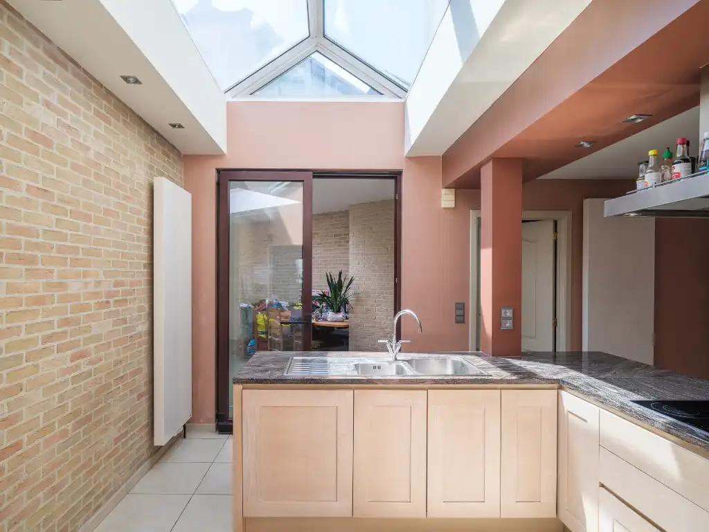 Sint-Amandsberg – Ruime interbellumwoning met 4 slaapkamers, tuin, dubbele garage en polyvalente ruimte nabij het Bijgaardepark. foto 8