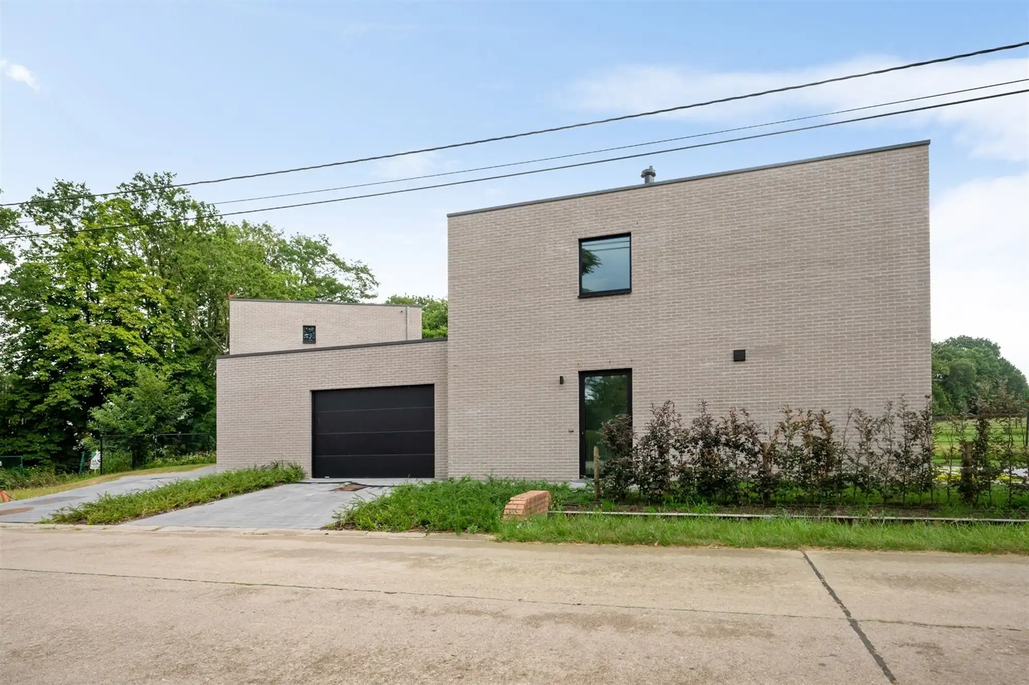 Nieuwbouwwoning met 3 SLPK en zuid-tuin te Sint-Katelijne-Waver foto {{pictureIndex}}