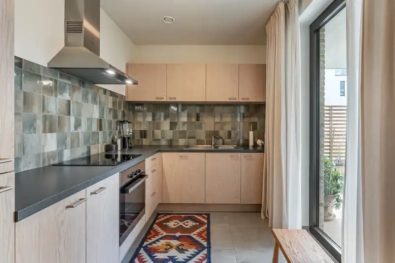 Recent en energiezuinig, gelijkvloers appartement met tuin, autostaanplaats en berging foto 10