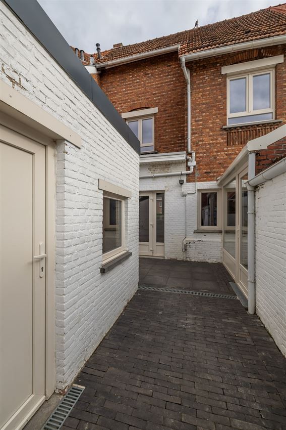 Stadswoning met 3slk en tuintje op topligging foto 40