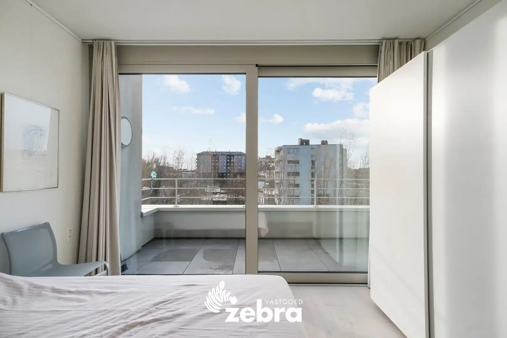 Moderne serviceflat met prachtig zicht op de Leie en autostaanplaats te Deinze! foto 13