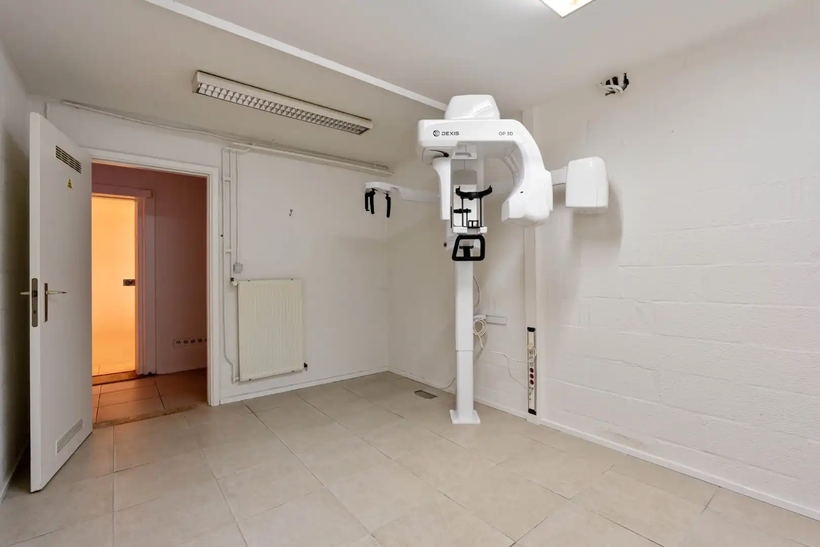 Ruim, zeer energiezuinig kantoor in het centrum van Neeroeteren met diverse mogelijkheden!   foto 23