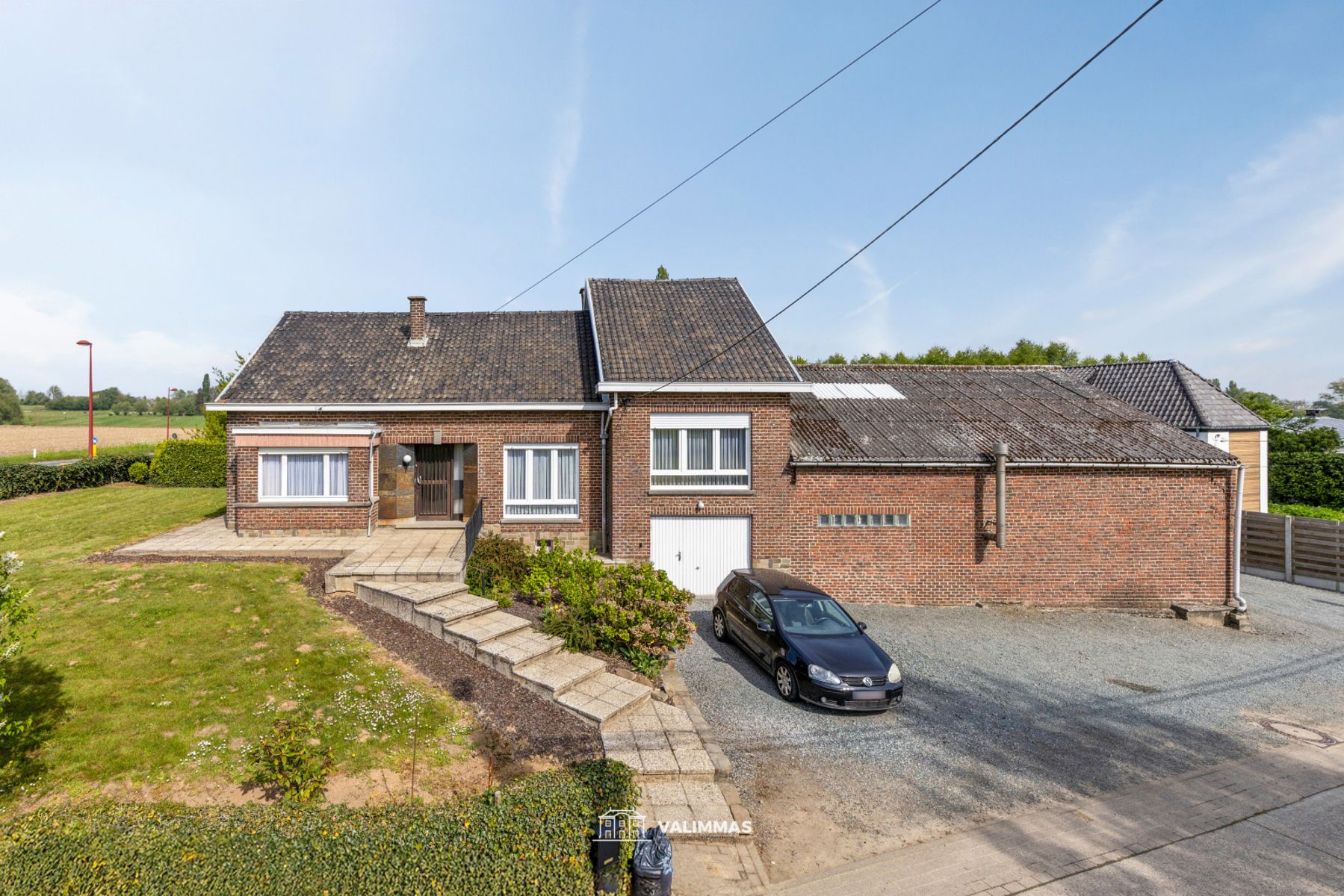 Ruime alleenstaande woning op ± 22 are, met atelier en tuin foto 4