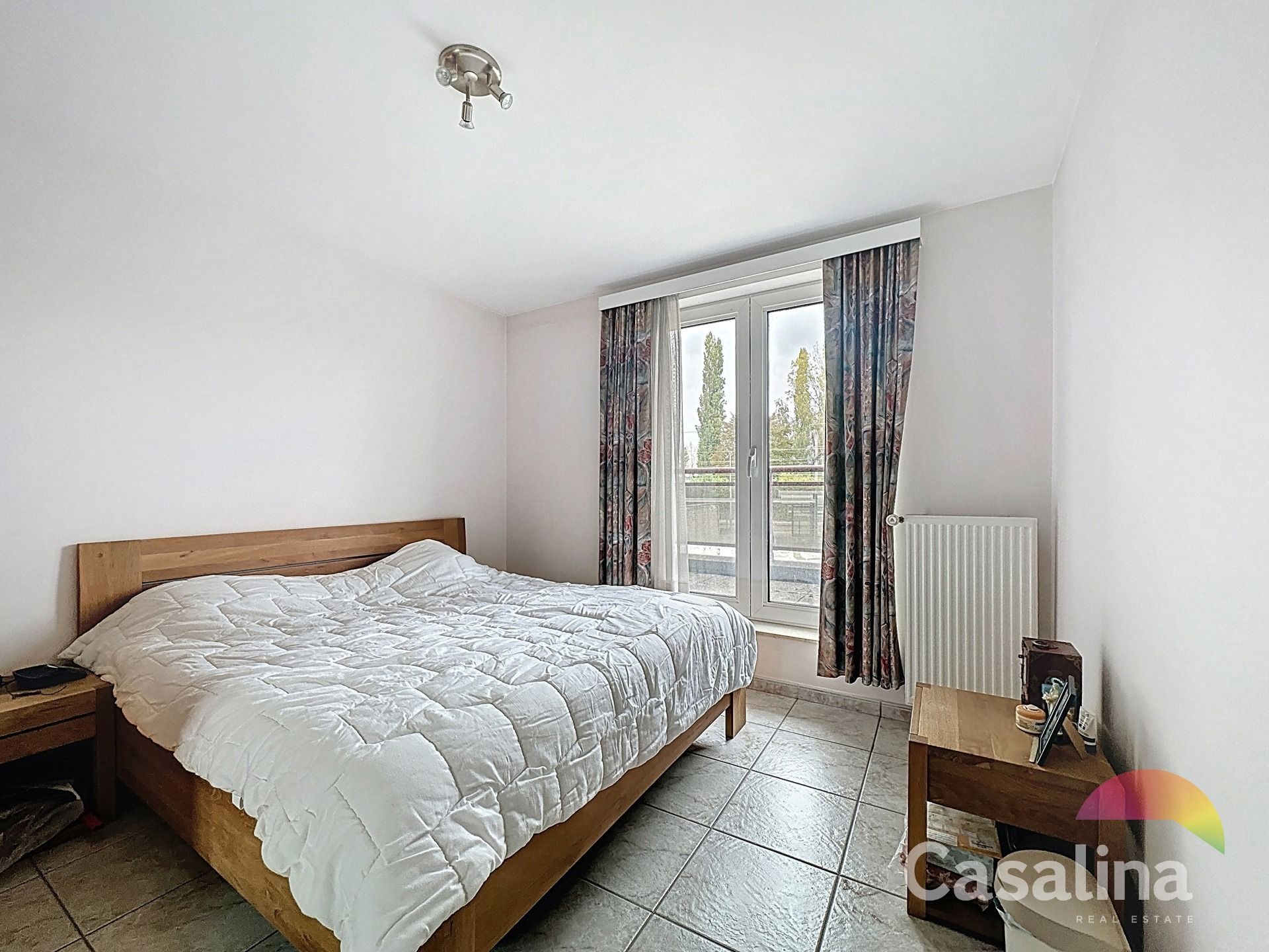 Gemengd gebouw bestaande uit 2 handelsruimtes en 4 woonunits foto 12