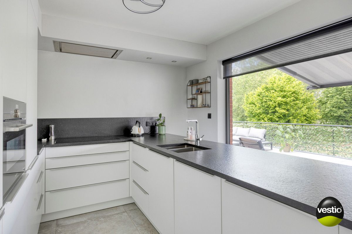 PRACHTIG APPARTEMENT VAN 90M² MET 2 SLK AAN STADSRAND BILZEN. foto 12