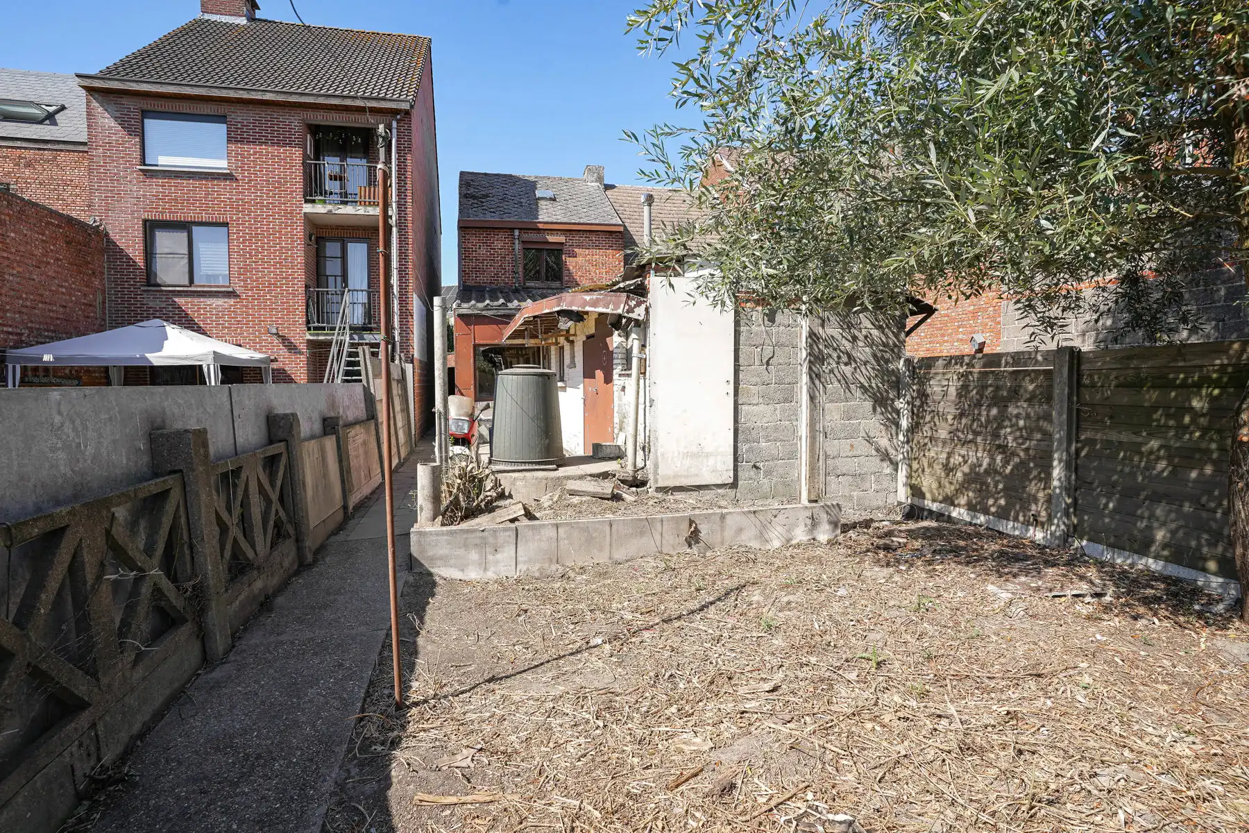 Te renoveren rijwoning met tuin te Kapelle-op-den-Bos foto 27