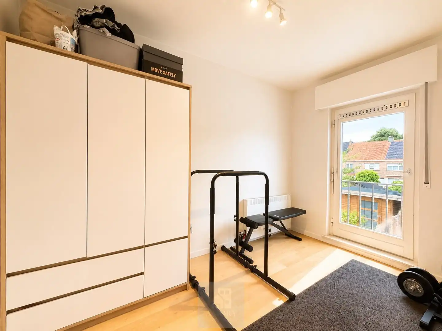Gerenoveerd 2-slaapkamerappartement met garagebox in Wondelgem foto 9
