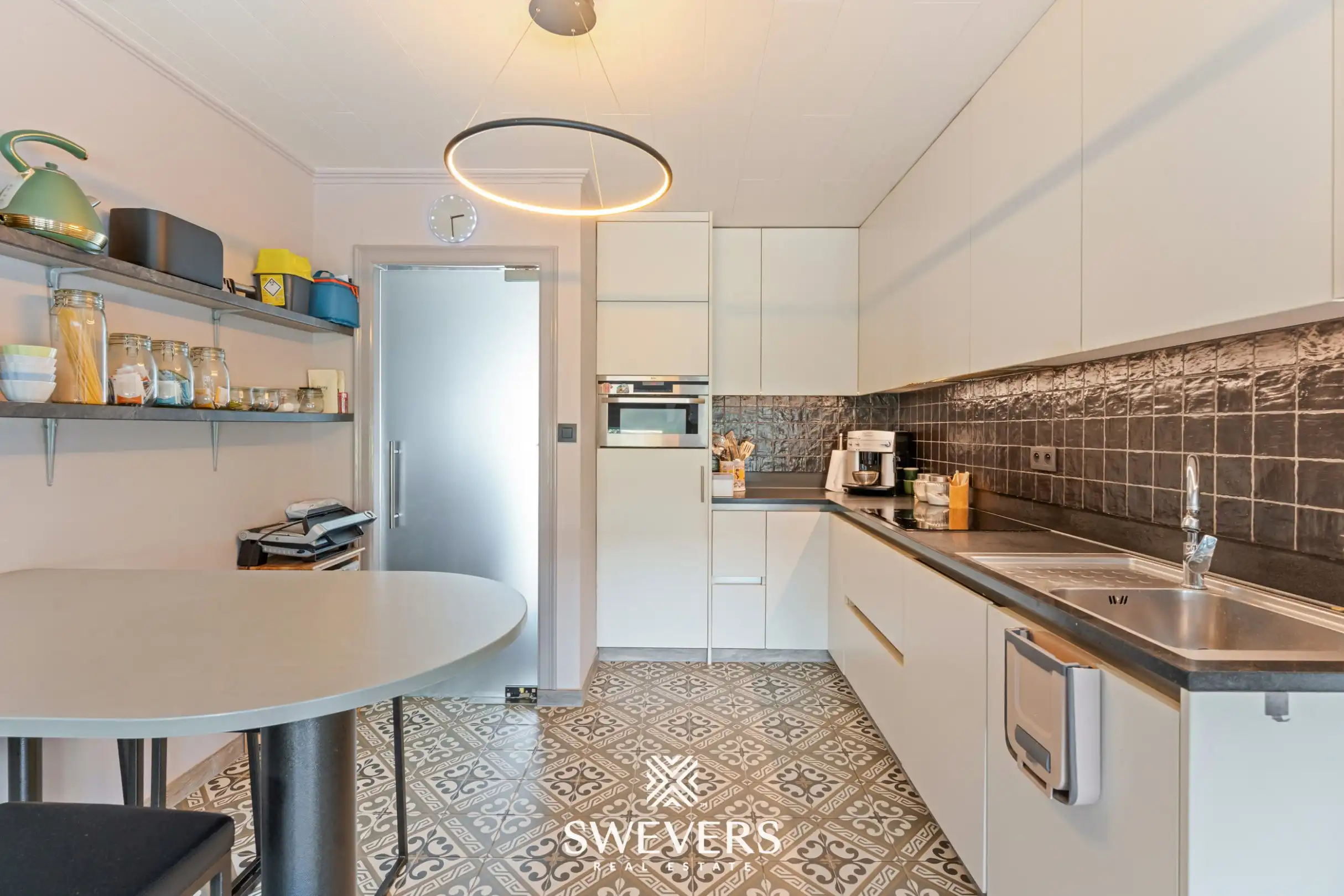 Instapklare gelijkvloerse woning met onderhoudsvriendelijke tuin op centrale locatie in Diepenbeek foto 10