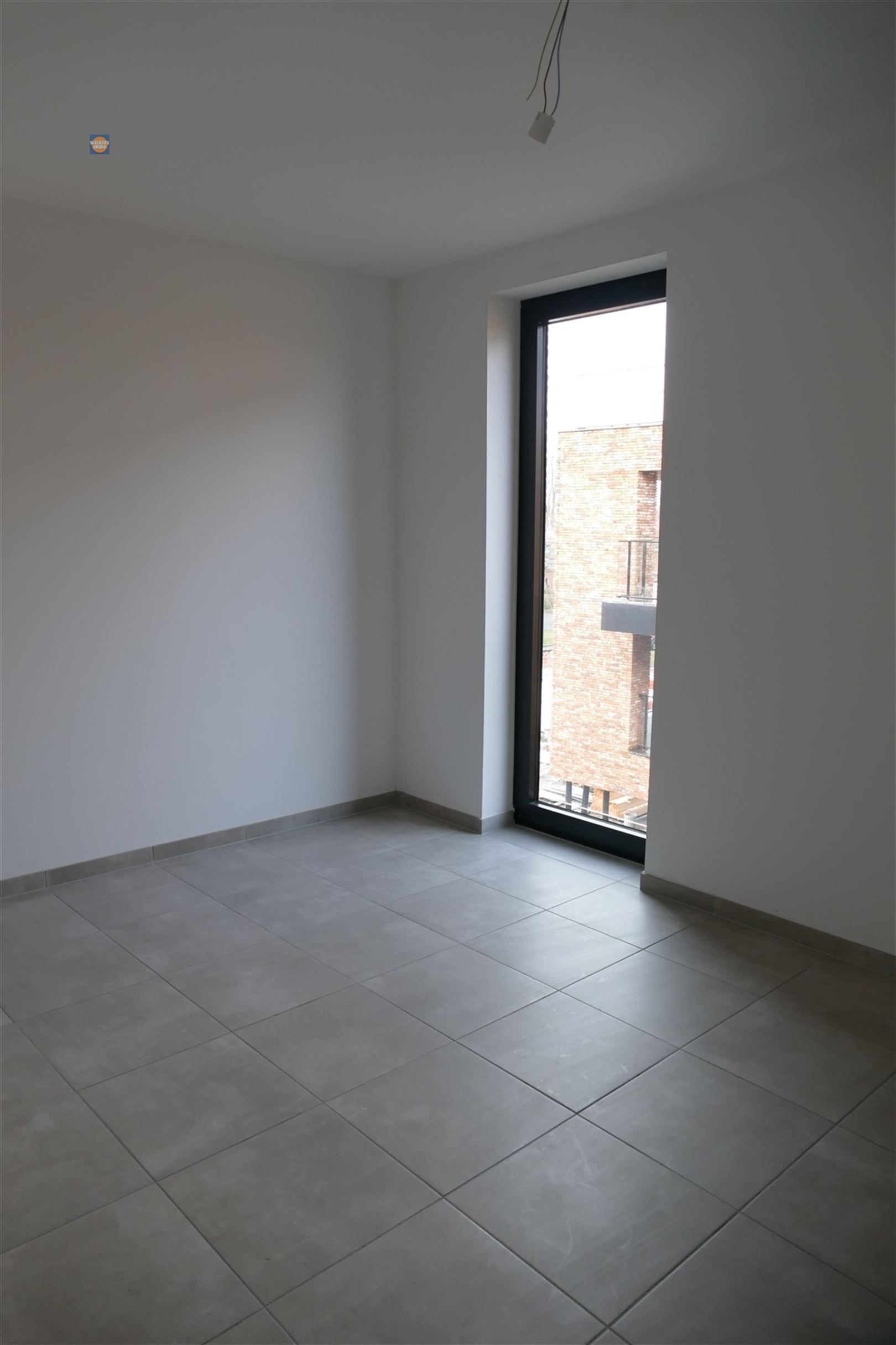 Lichtrijk appartement met terras en autostaanplaats op centrale ligging foto 10