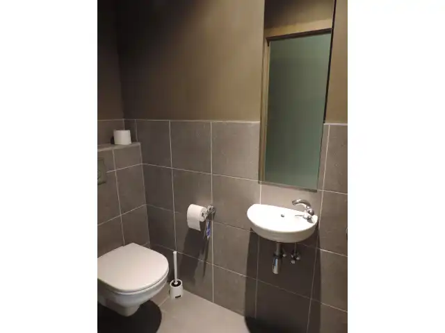 Ruim appartement met autostaanplaats vlakbij het centrum foto 12