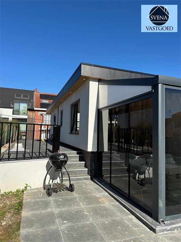 WONING MET HANDELSRUIMTE EN 3 SLAAPKAMERS foto 7
